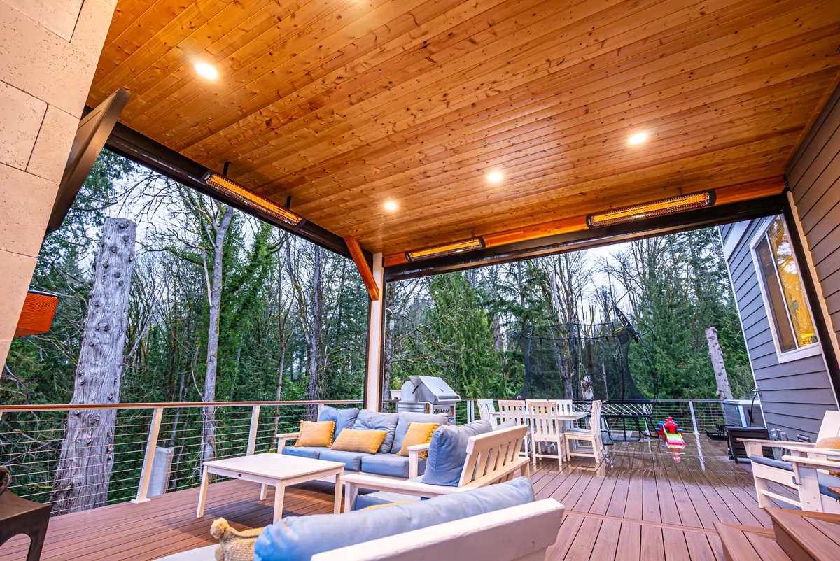 Backyard transformation with covered patio, water feature and hot tub in Bothell, WA